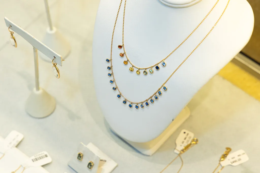 Overhead view of necklace display in Dandelion