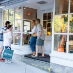 family outside PU Art museum store