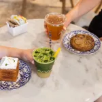 up close maman table with drinks and pastries