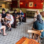 halo pub interior seats with customers