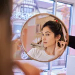 rowan corporate marketing image of ear piercing