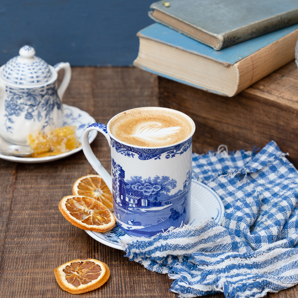 orange blossom latte in mug on table