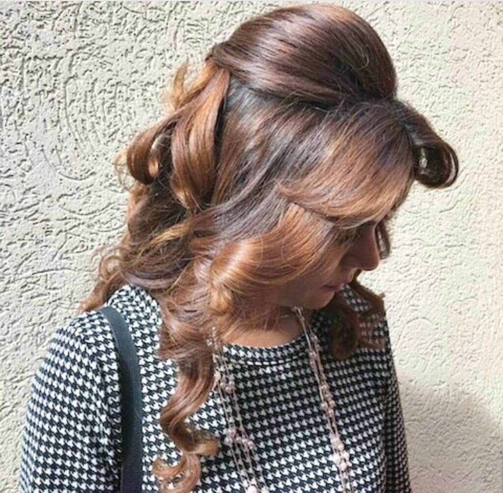 Salon Pure instagram of half of half down curls